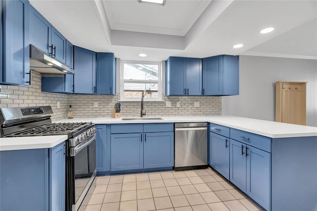 3730 Huntlee Dr, New Orleans, LA 70131 - kitchen with appliances with stainless steel finishes, a sink, under cabinet range hood, blue cabinets, and crown molding