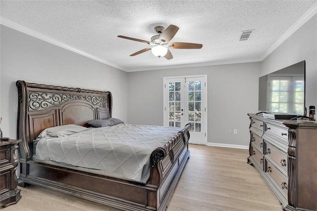 bedroom featuring multiple windows, access to outside, light wood-type flooring, and ceiling fan