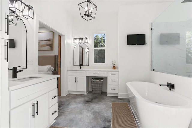 bathroom featuring concrete flooring, vanity, a tub to relax in, and a notable chandelier