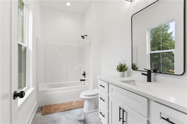 full bathroom featuring vanity, toilet, shower / washtub combination, and concrete floors