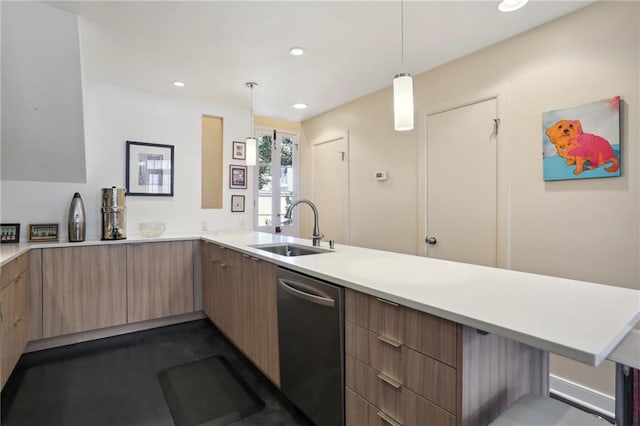 kitchen featuring dishwasher, kitchen peninsula, decorative light fixtures, and sink