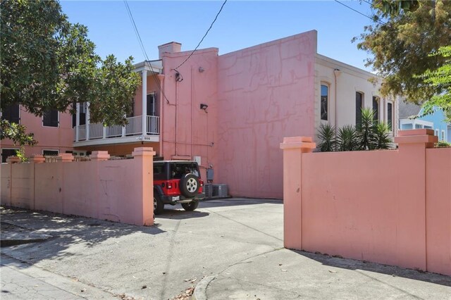 view of property exterior featuring a balcony