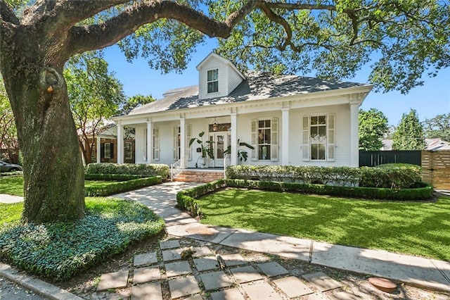 view of front of house featuring a front lawn and a porch