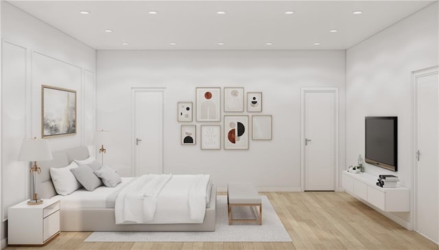 bedroom featuring light hardwood / wood-style flooring