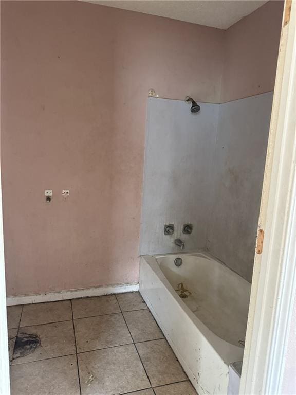 bathroom featuring shower / washtub combination and tile patterned floors