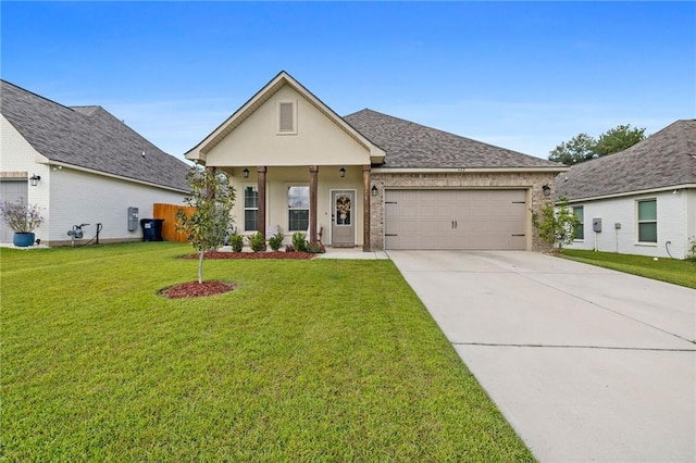 view of front of property featuring a front lawn and a garage