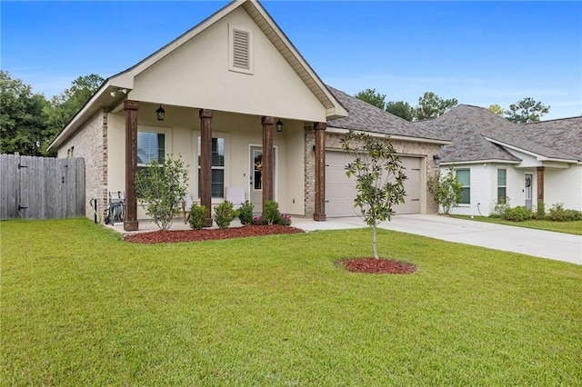 view of front of home featuring a front lawn and a garage