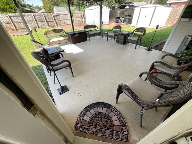 view of patio with a storage shed