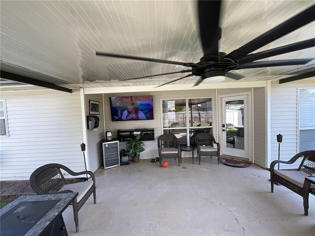 view of patio featuring ceiling fan