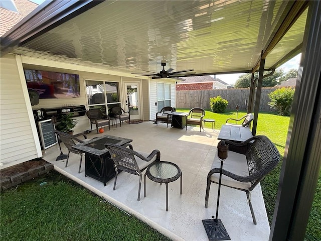 view of patio featuring an outdoor hangout area and ceiling fan