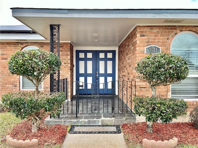 entrance to property featuring french doors