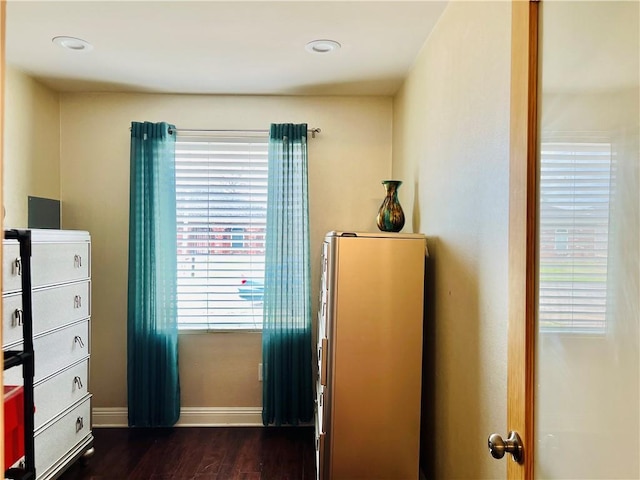 bedroom featuring dark wood-type flooring