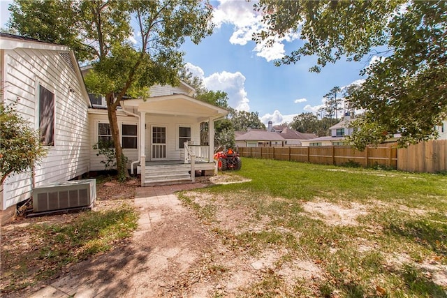 view of yard featuring central AC