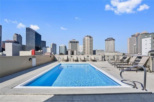 333 Julia St Unit 508, New Orleans, LA 70130 - community pool featuring a skyline view and a patio