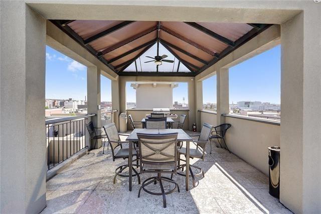 333 Julia St Unit 508, New Orleans, LA 70130 - view of patio / terrace with ceiling fan, a gazebo, and outdoor dining space