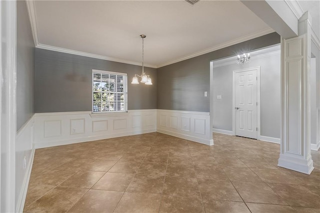 unfurnished dining area with tile patterned floors, crown molding, and a chandelier