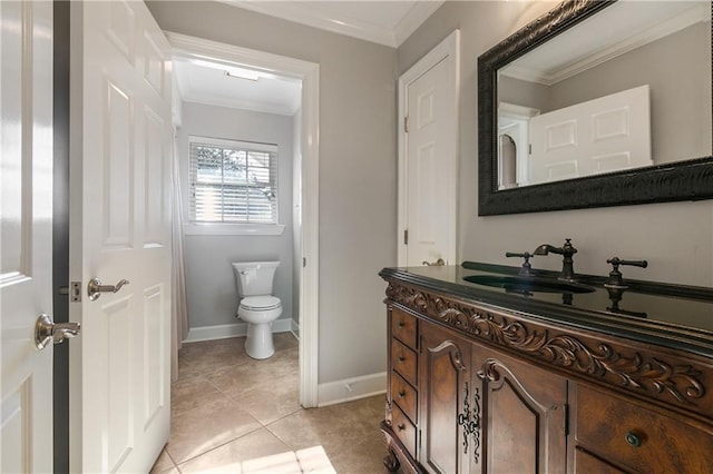 bathroom with tile patterned floors, crown molding, vanity, and toilet