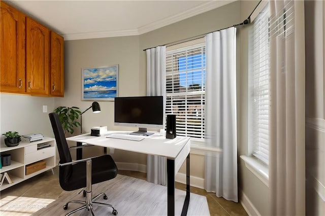 office area with light tile patterned floors and crown molding