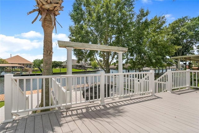 wooden terrace with a water view