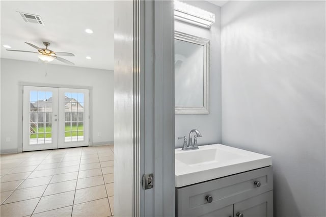 bathroom featuring french doors, tile patterned floors, ceiling fan, and vanity