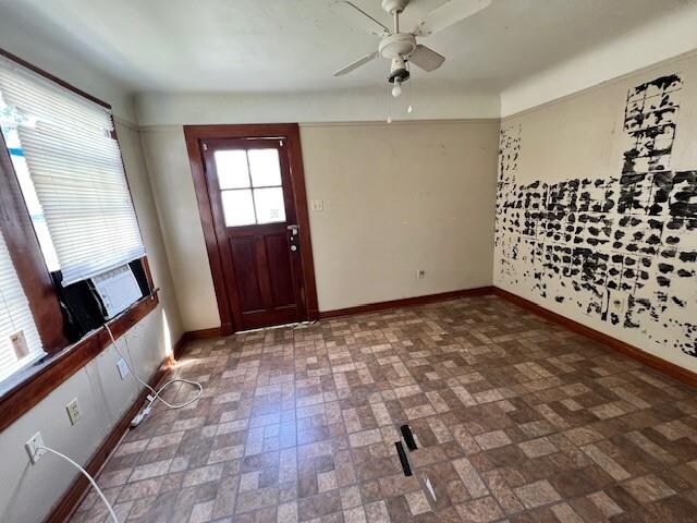 entryway featuring ceiling fan