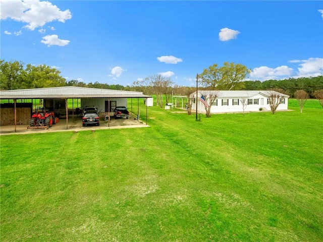 view of yard featuring a carport