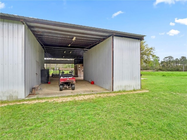 view of parking / parking lot with a lawn