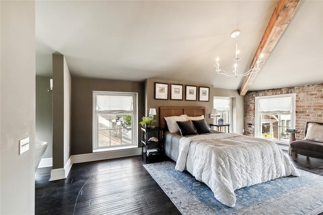 bedroom with lofted ceiling with beams, dark wood-type flooring, and a chandelier