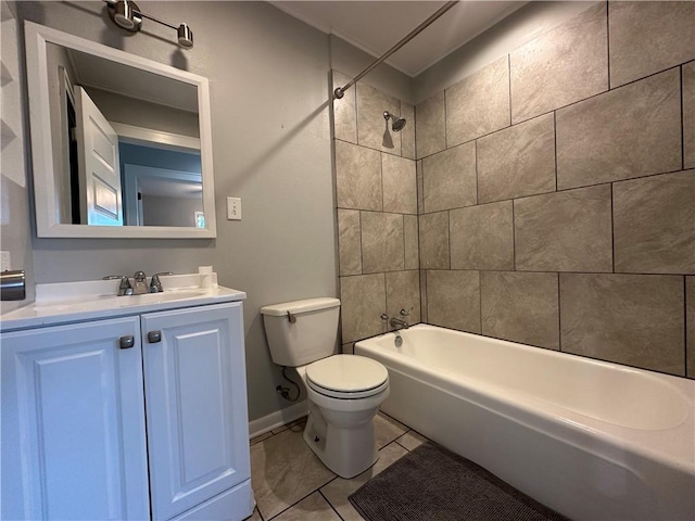 full bathroom with vanity, tiled shower / bath combo, and toilet