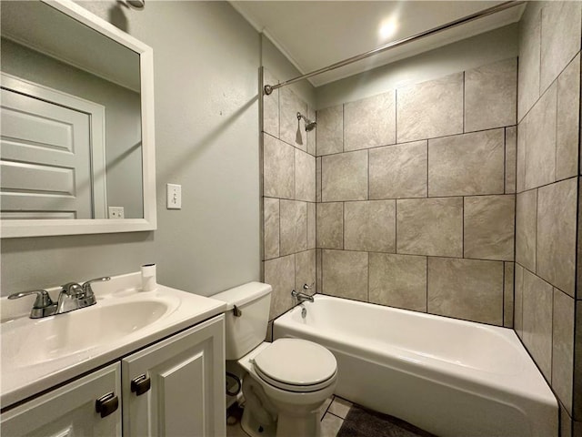 full bathroom with vanity, toilet, and tiled shower / bath combo