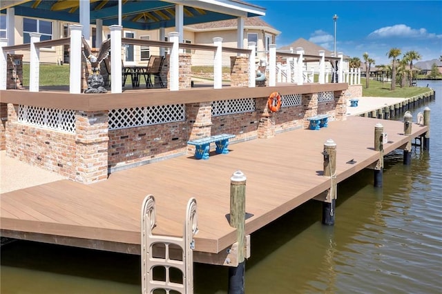 dock area featuring a water view