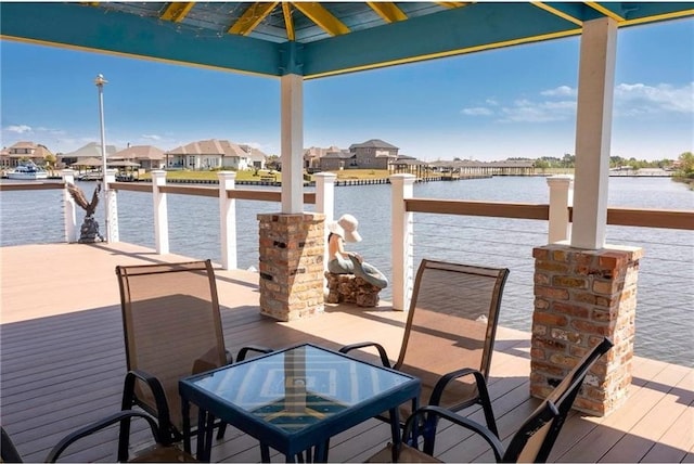 view of dock with a water view