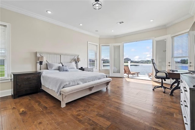 bedroom featuring dark wood-type flooring, crown molding, a water view, and access to outside