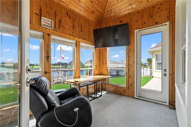 sunroom with wood ceiling, a water view, and vaulted ceiling