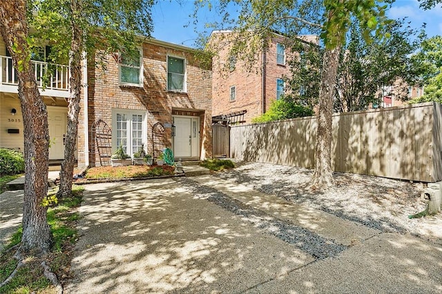 view of front of home with a balcony