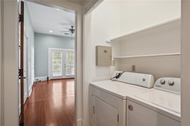 clothes washing area featuring french doors, ceiling fan, washer and dryer, and dark hardwood / wood-style flooring