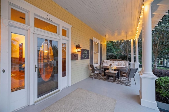 view of patio featuring a porch