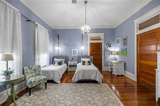 bedroom with crown molding, dark wood-type flooring, and an inviting chandelier