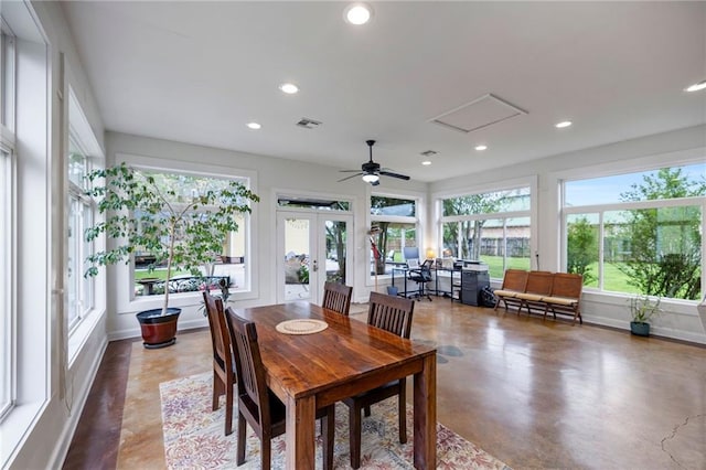 sunroom / solarium featuring french doors and ceiling fan