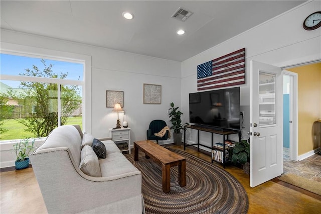 living room featuring concrete floors