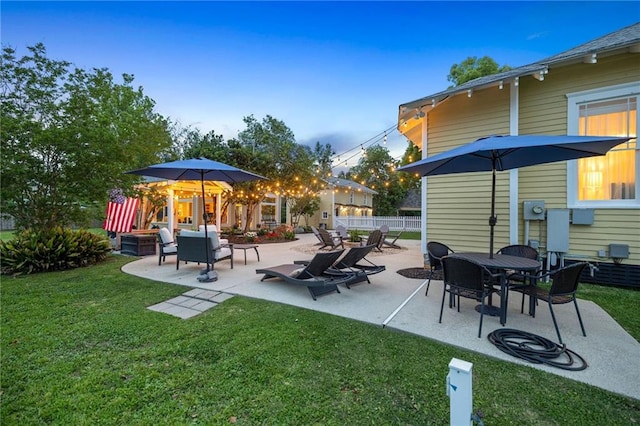 view of yard with outdoor lounge area and a patio area