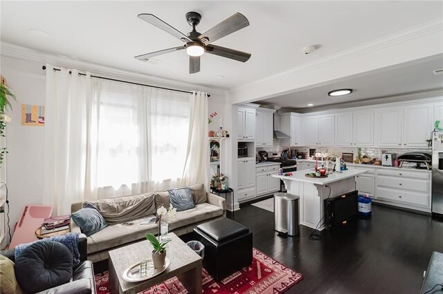 4670 Marigny St, New Orleans, LA 70122 - living area featuring a ceiling fan, crown molding, and dark wood-style floors