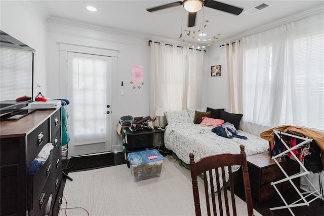 4670 Marigny St, New Orleans, LA 70122 - bedroom with ornamental molding and ceiling fan