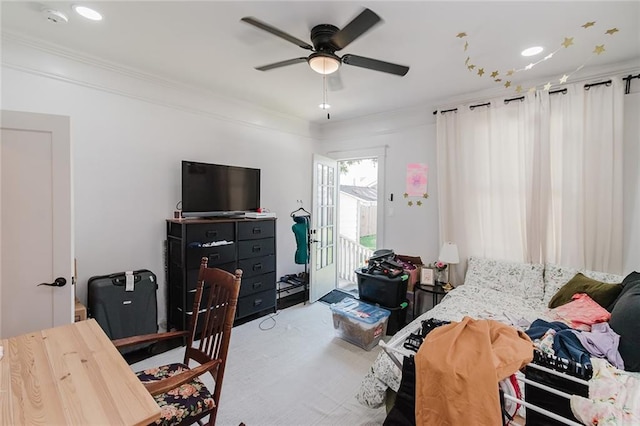 4670 Marigny St, New Orleans, LA 70122 - bedroom featuring access to exterior, carpet flooring, ornamental molding, and a ceiling fan