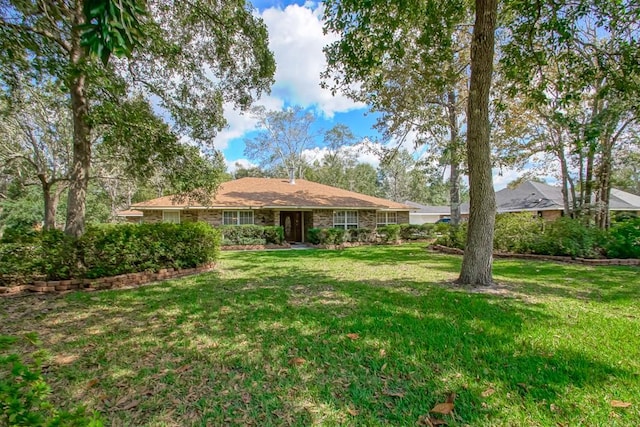 exterior space featuring a front yard