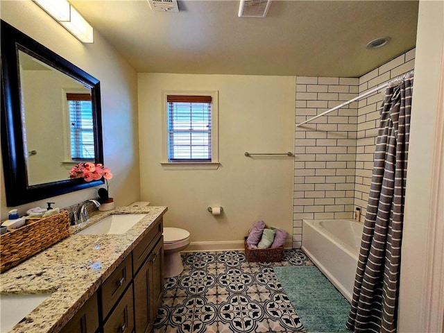 full bathroom with shower / bath combination with curtain, vanity, toilet, and tile patterned floors