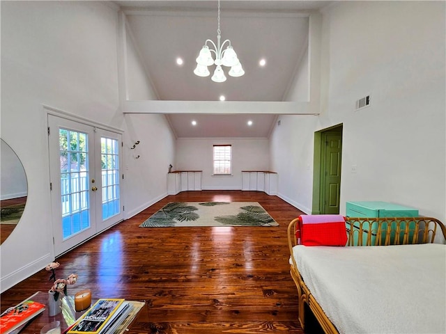 living room featuring high vaulted ceiling, dark wood-type flooring, a healthy amount of sunlight, and french doors