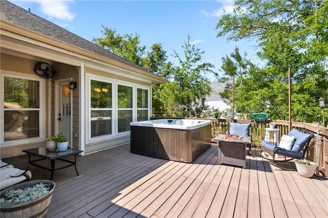 wooden terrace with a hot tub