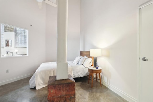 bedroom with concrete floors