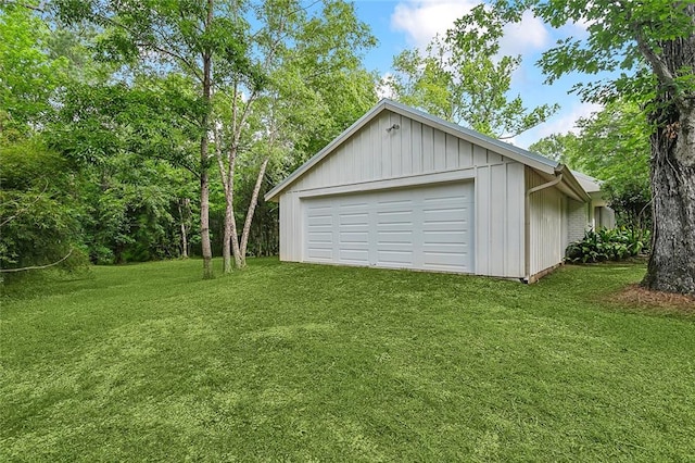 garage with a yard